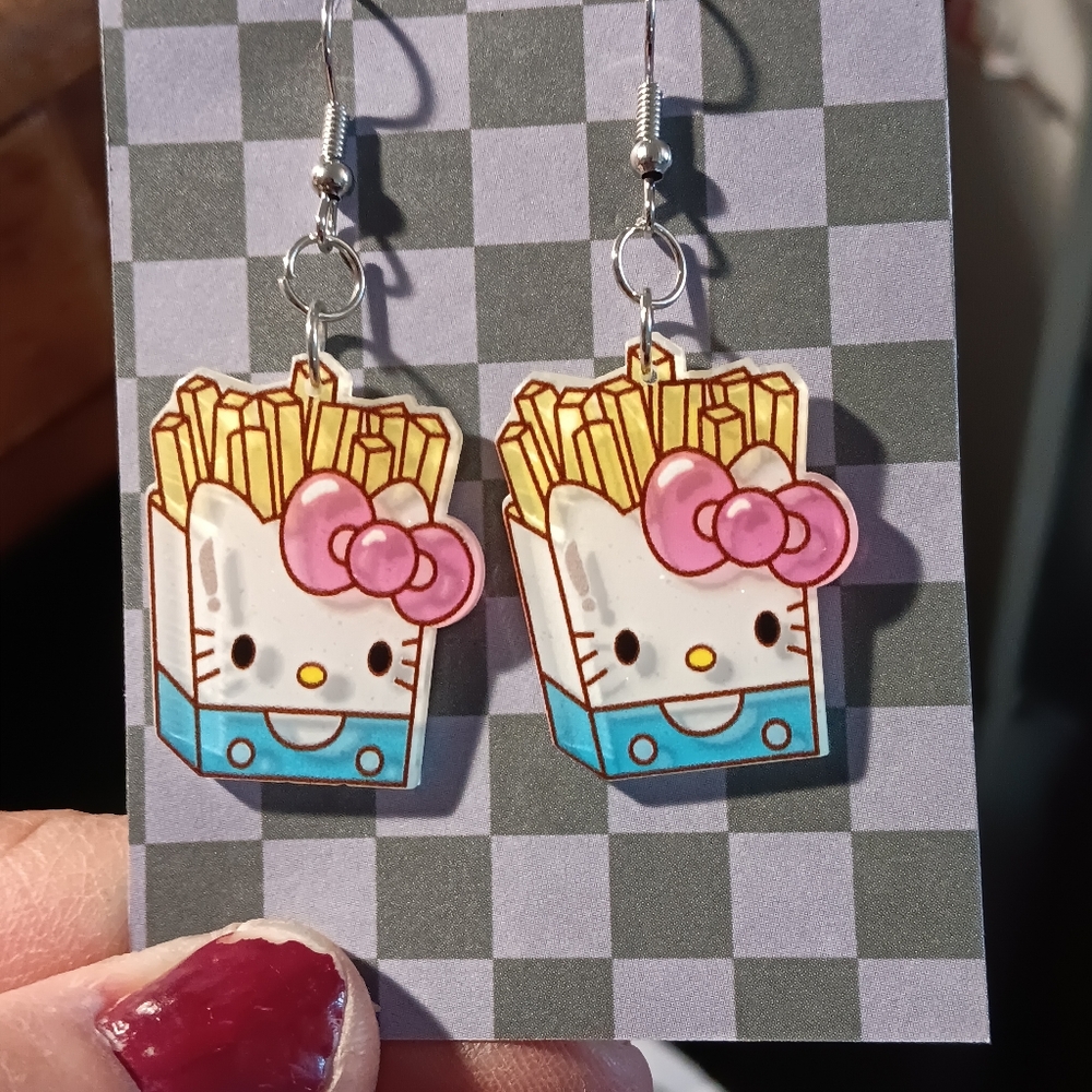Hello kitty says fries before guys earrings